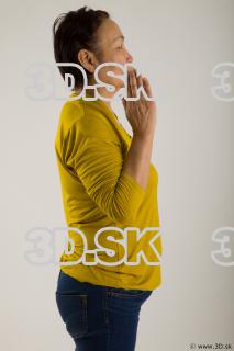 Arm flexing reference of yellow sweater blue jeans Gwendolyn 0015